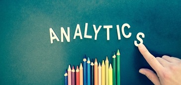 colored pencils below the word 'ANALYTICS'
