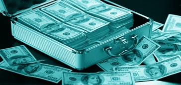 open briefcase full of $100 bills